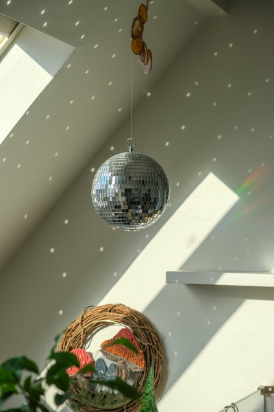 Watch: 50 Disco Balls Fill a Room With Magical Shimmering Light